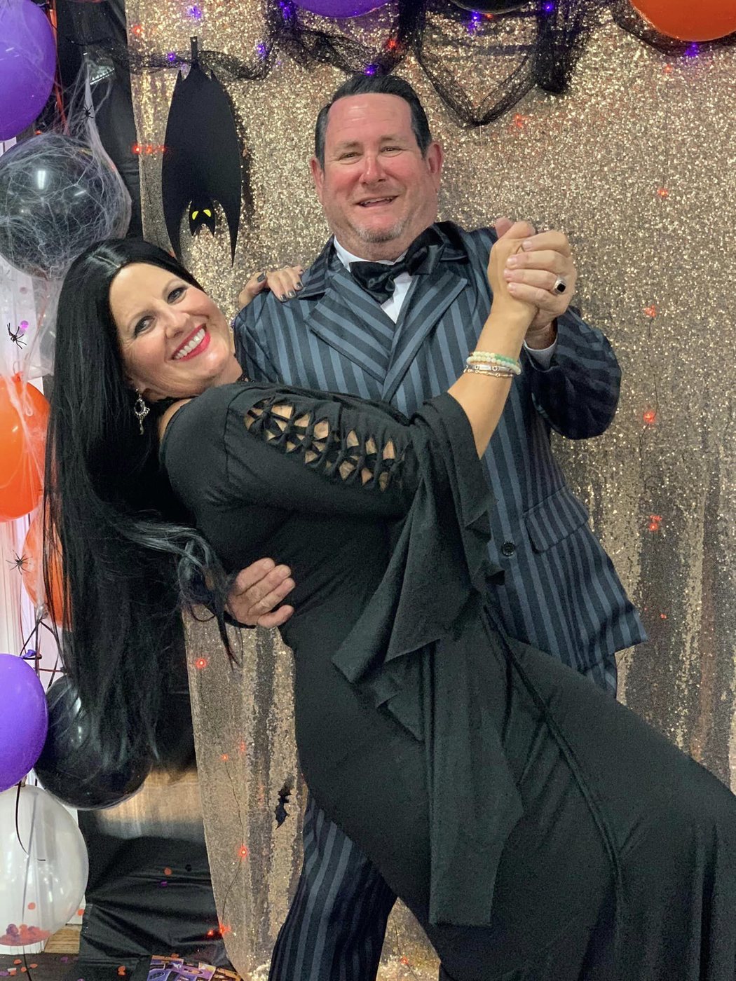 Costumed marina guests celebrating at the Brunswick Landing Halloween party