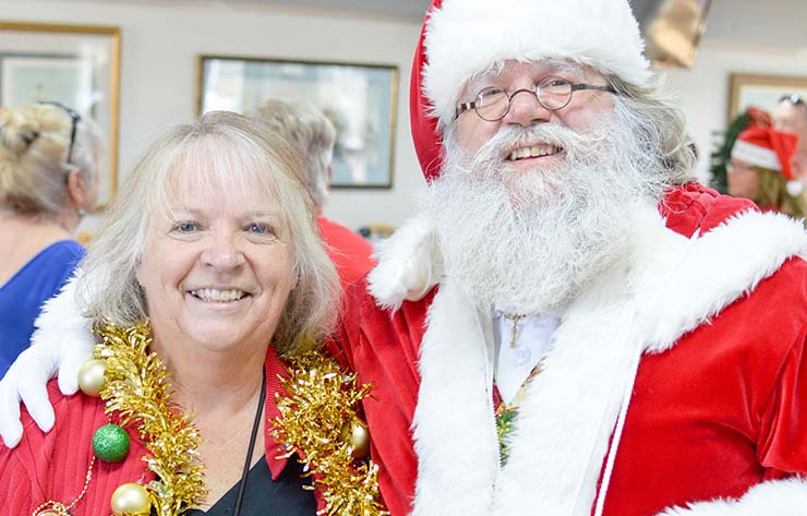 Marina guests celebrating together at a holiday party